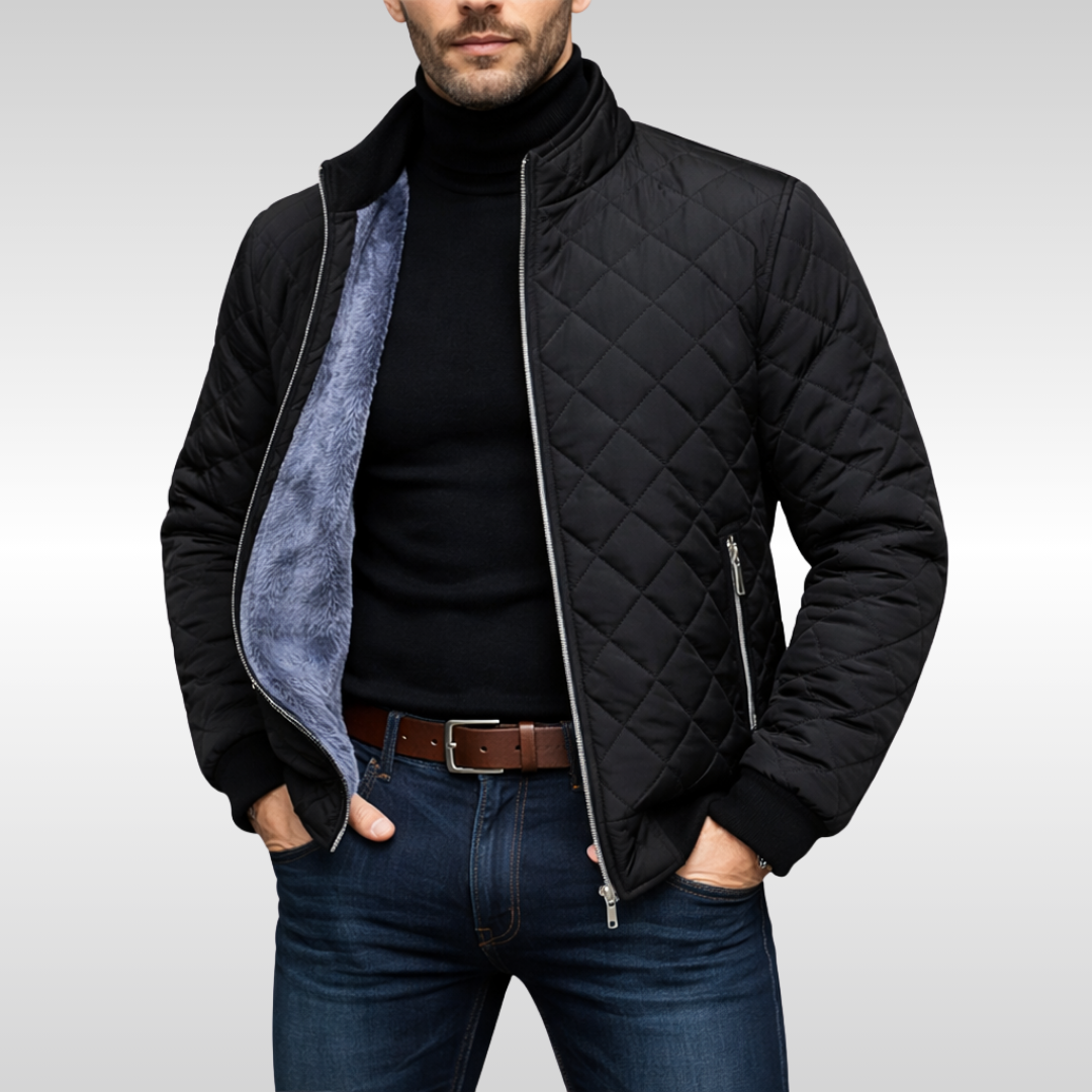 Black quilted bomber jacket styled with polo neck and denim jeans