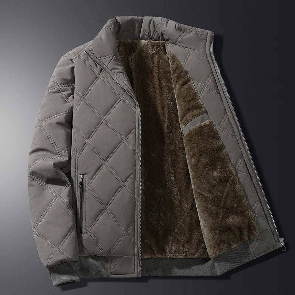 Grey diamond-quilted bomber jacket with fleece lining and stand-up collar