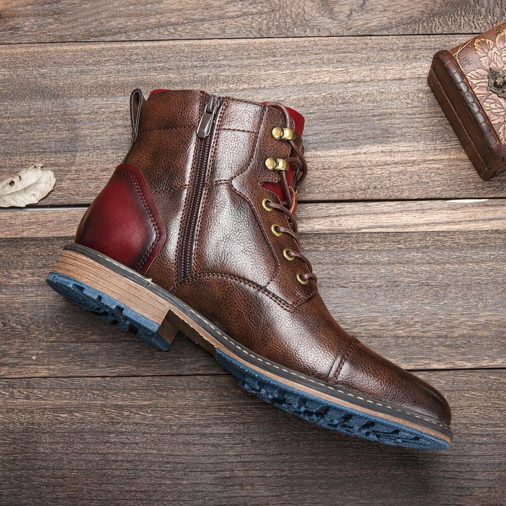 Side profile of brown leather ankle boot showing brass eyelets and blue sole
