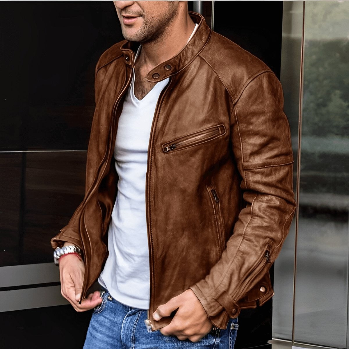 Brown vintage leather biker coat featuring zip pockets and snap collar detail