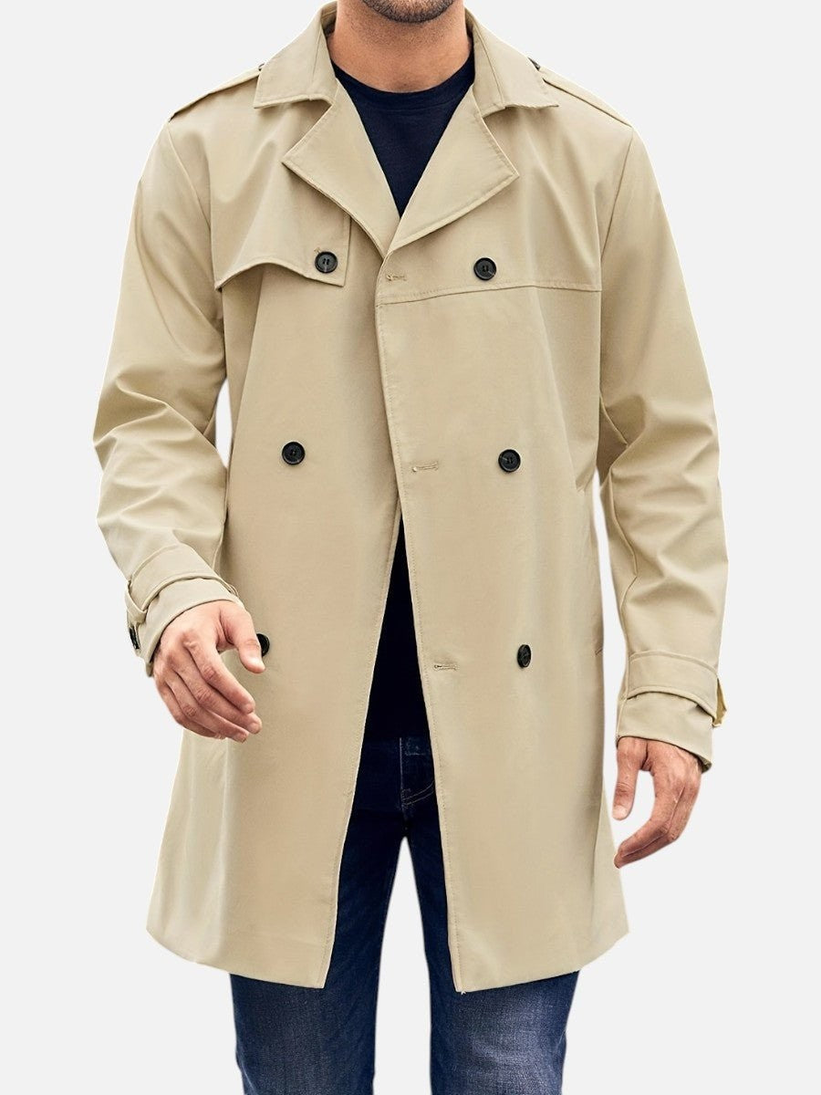 Man wearing beige double-breasted trench coat with button fastening, front view