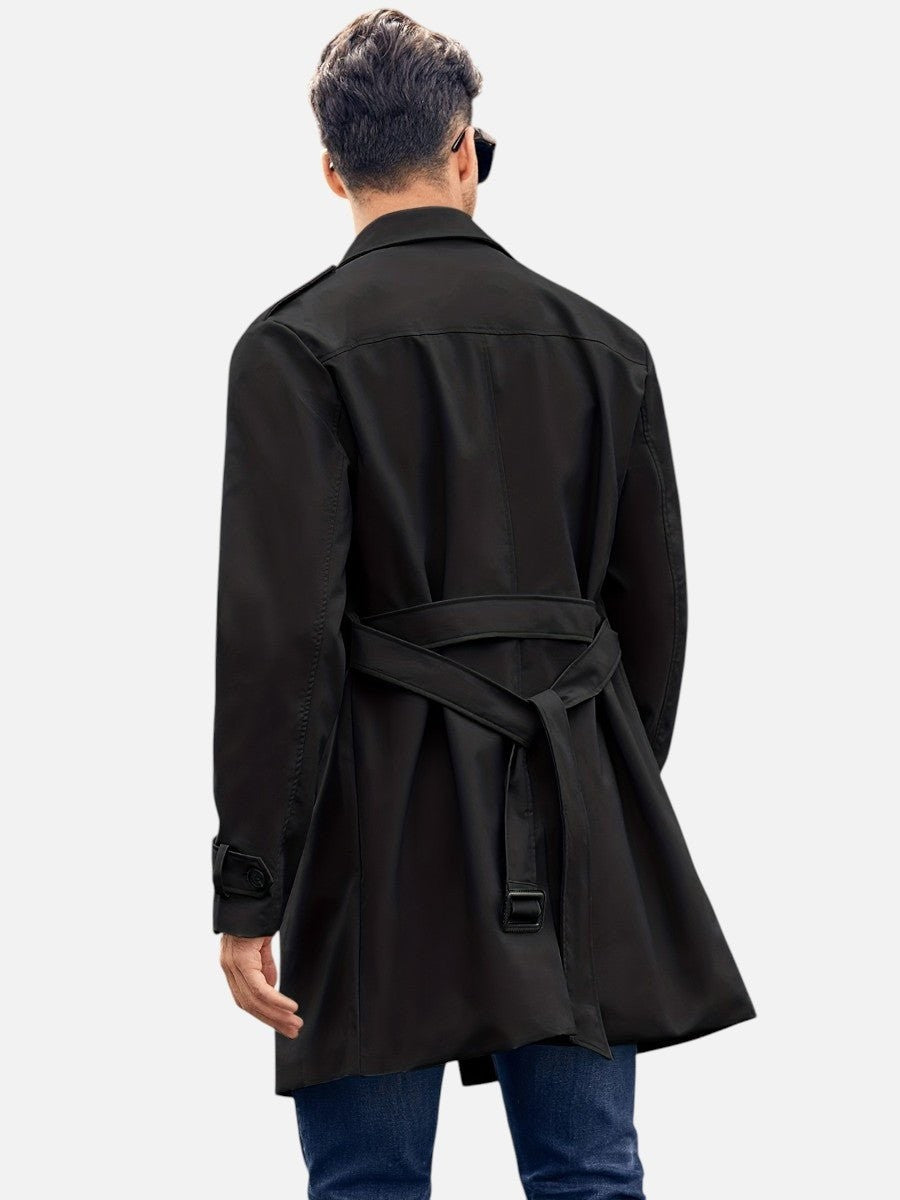 Belted black trench coat, back view highlighting waist tie