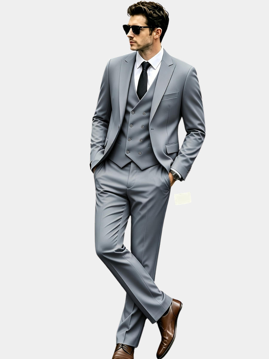 Grey three-piece suit with double-breasted waistcoat, peak lapel blazer and tailored trousers