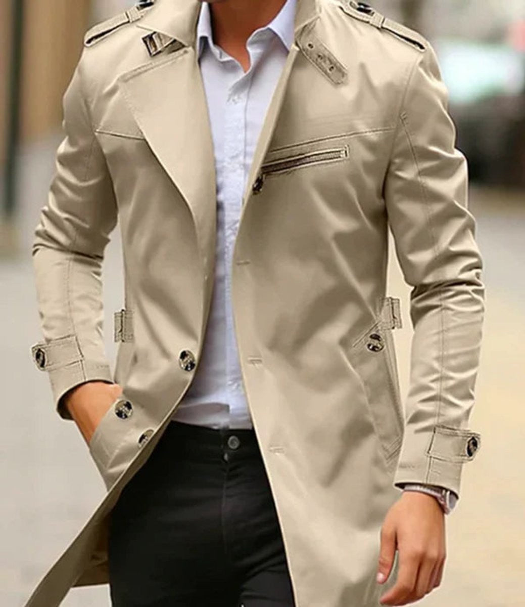 Beige single-breasted trench coat with shoulder straps and zip chest pocket