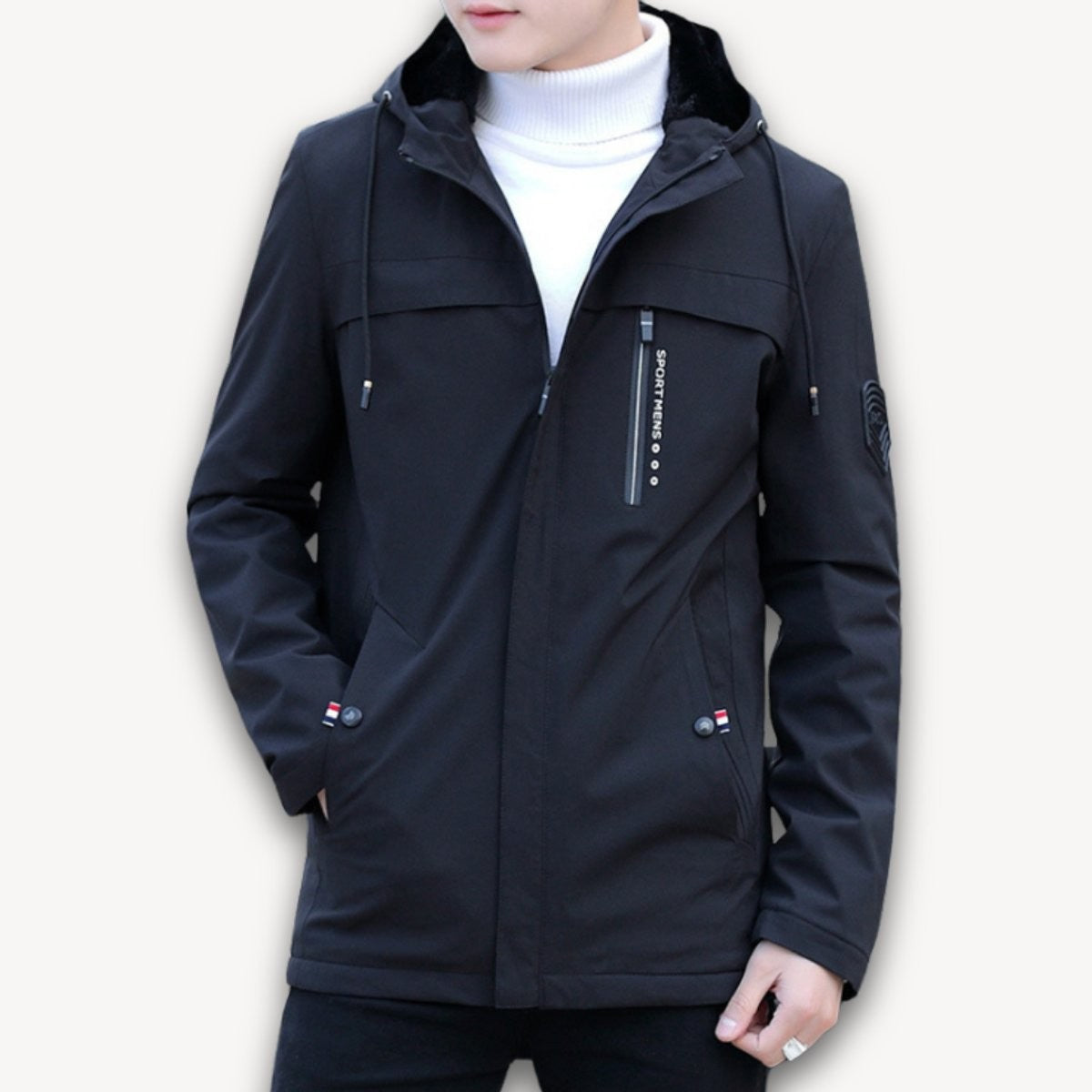 Man wearing black hooded jacket with fleece-lined collar and zip pocket