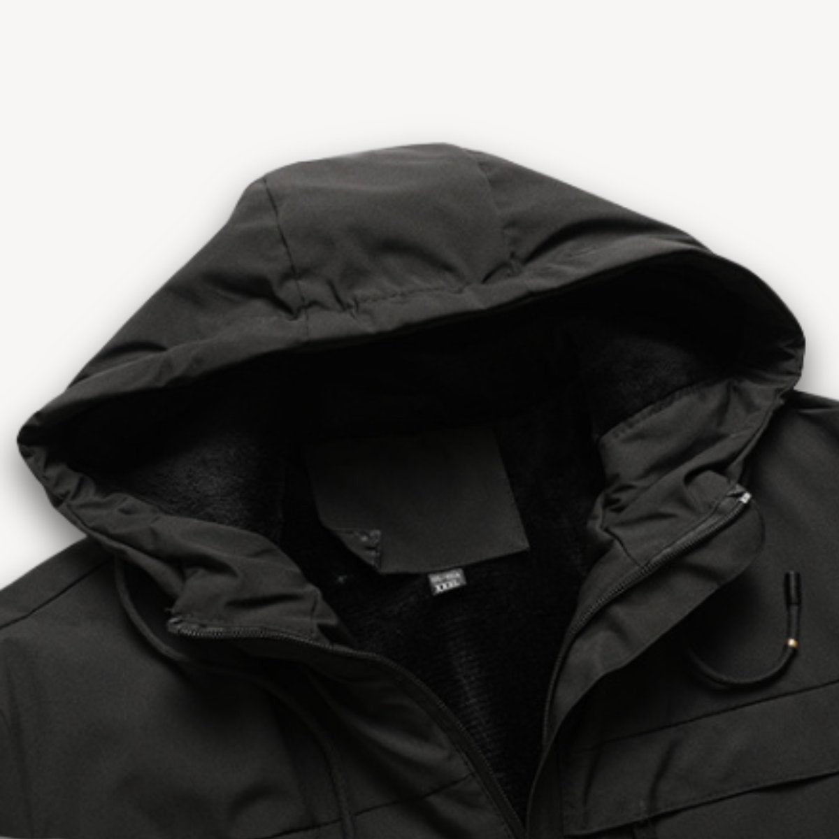 Close-up of black hood interior showing fleece lining and drawstring cord