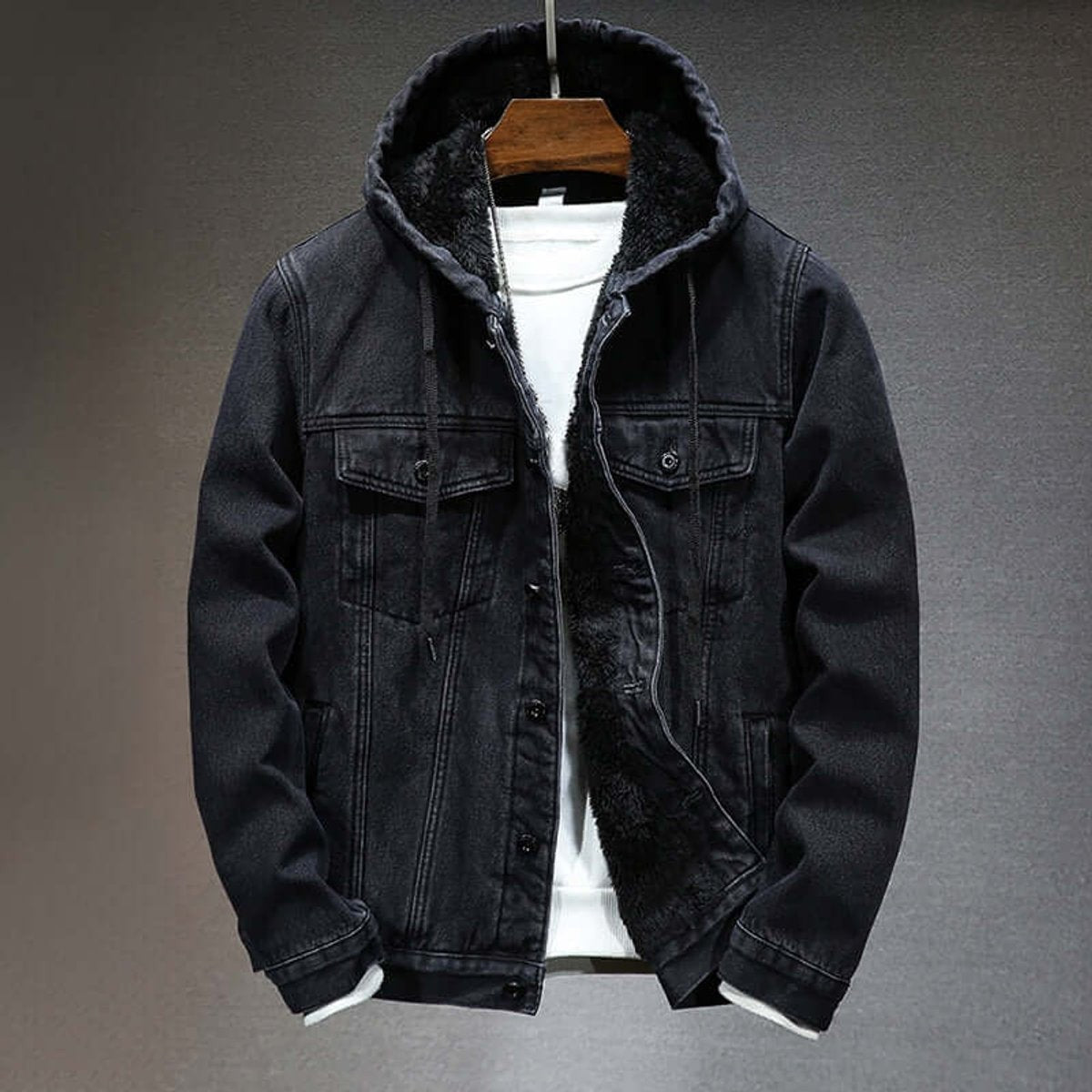 Black denim hooded jacket featuring fleece-lined hood and button cuffs