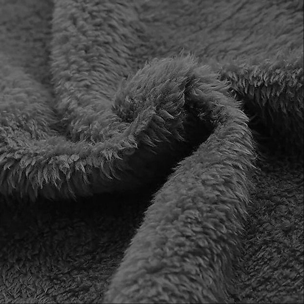 Close-up of soft grey fleece lining texture inside canvas jacket
