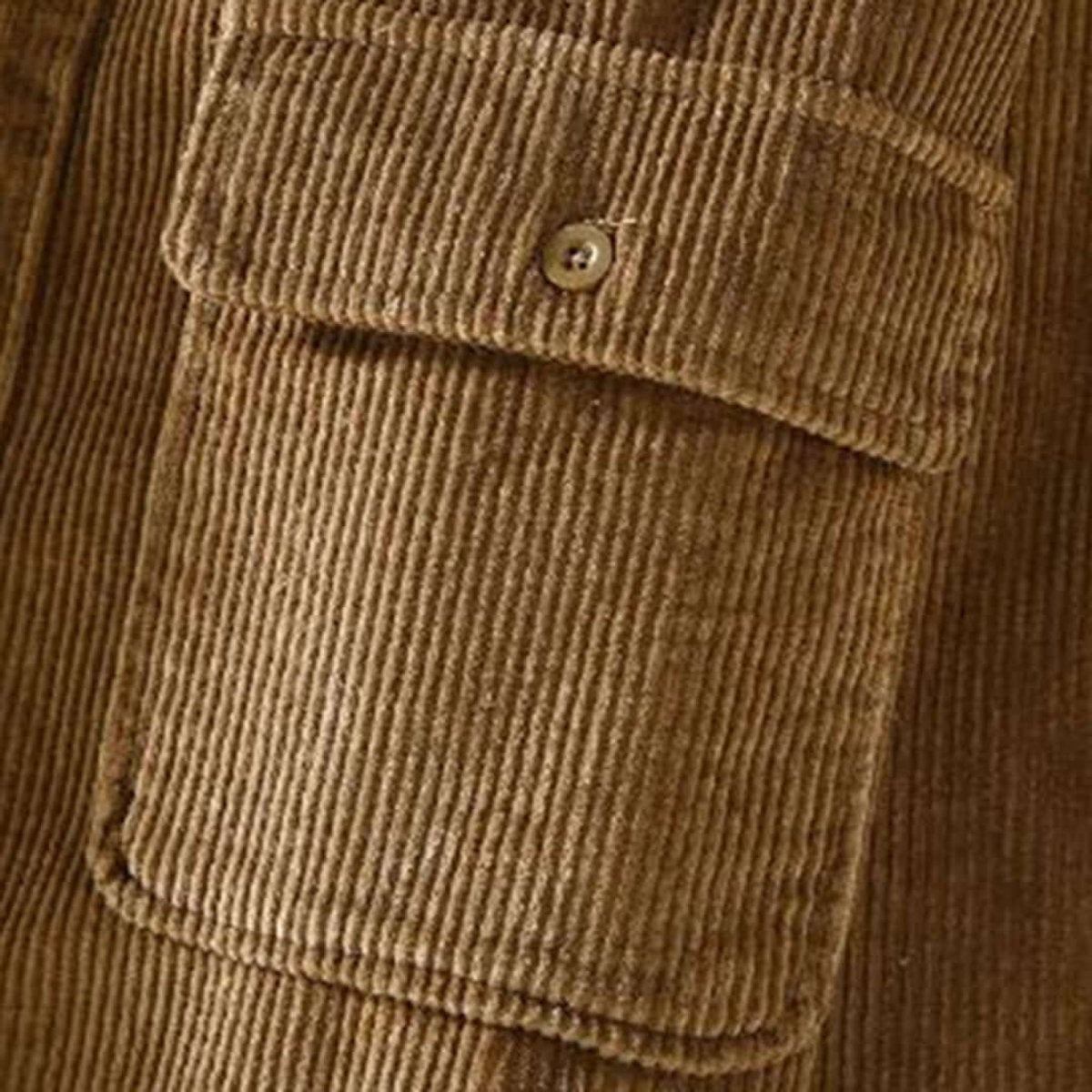 Close-up of flap chest pocket on camel corduroy shacket