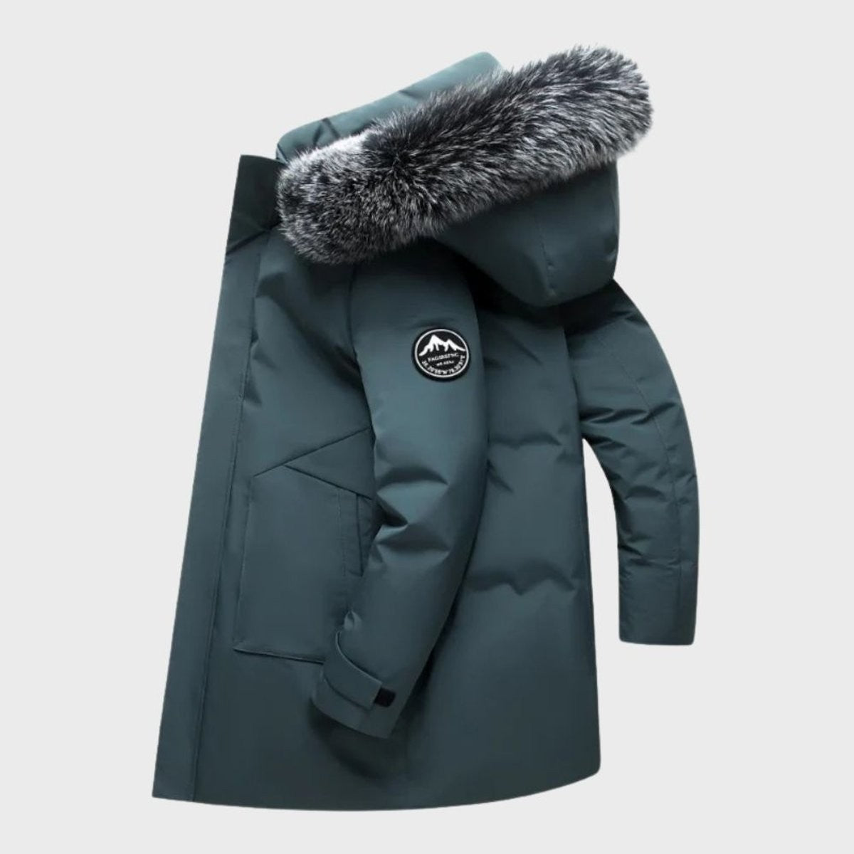 Teal quilted parka pictured side-on with fur-trimmed hooded collar