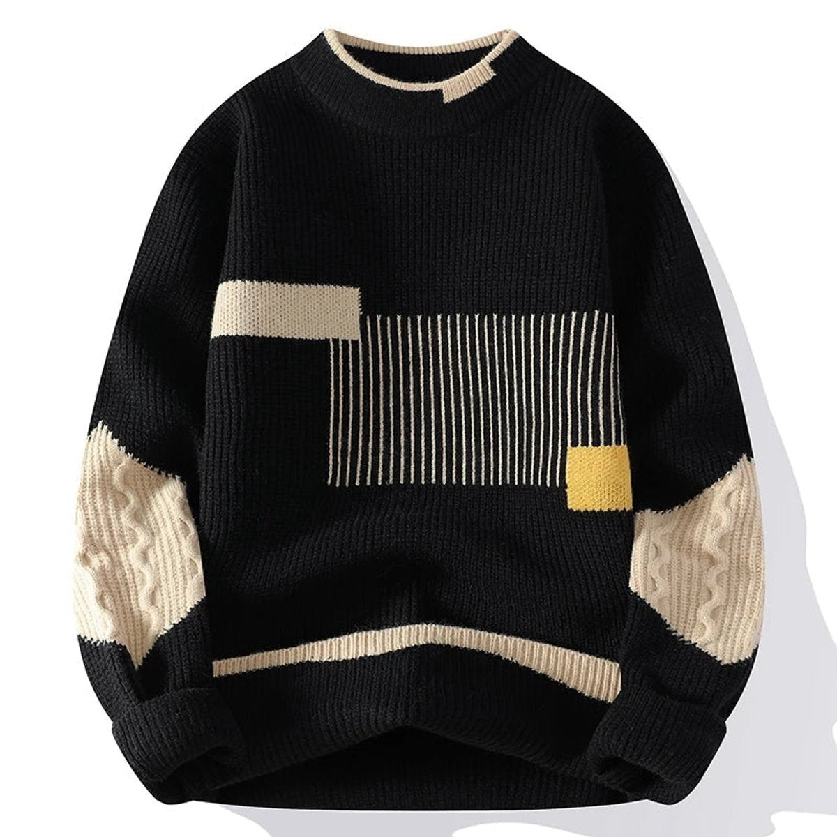 Black patchwork jumper with cream stripes and mustard yellow accent patch