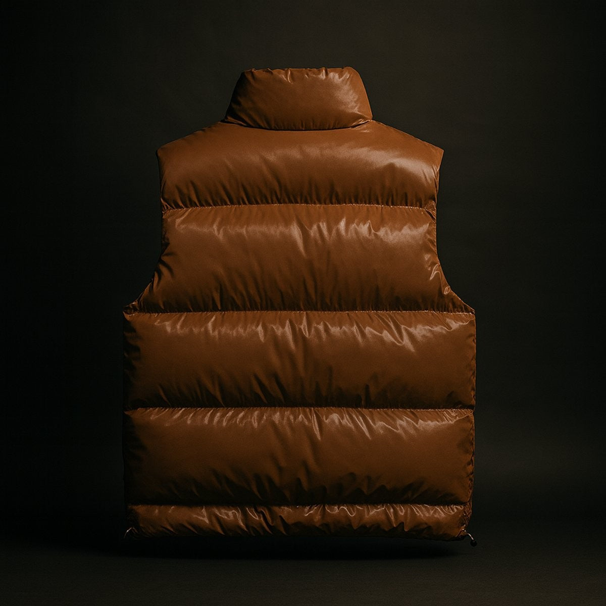 Rear view of tan quilted puffer vest with high collar