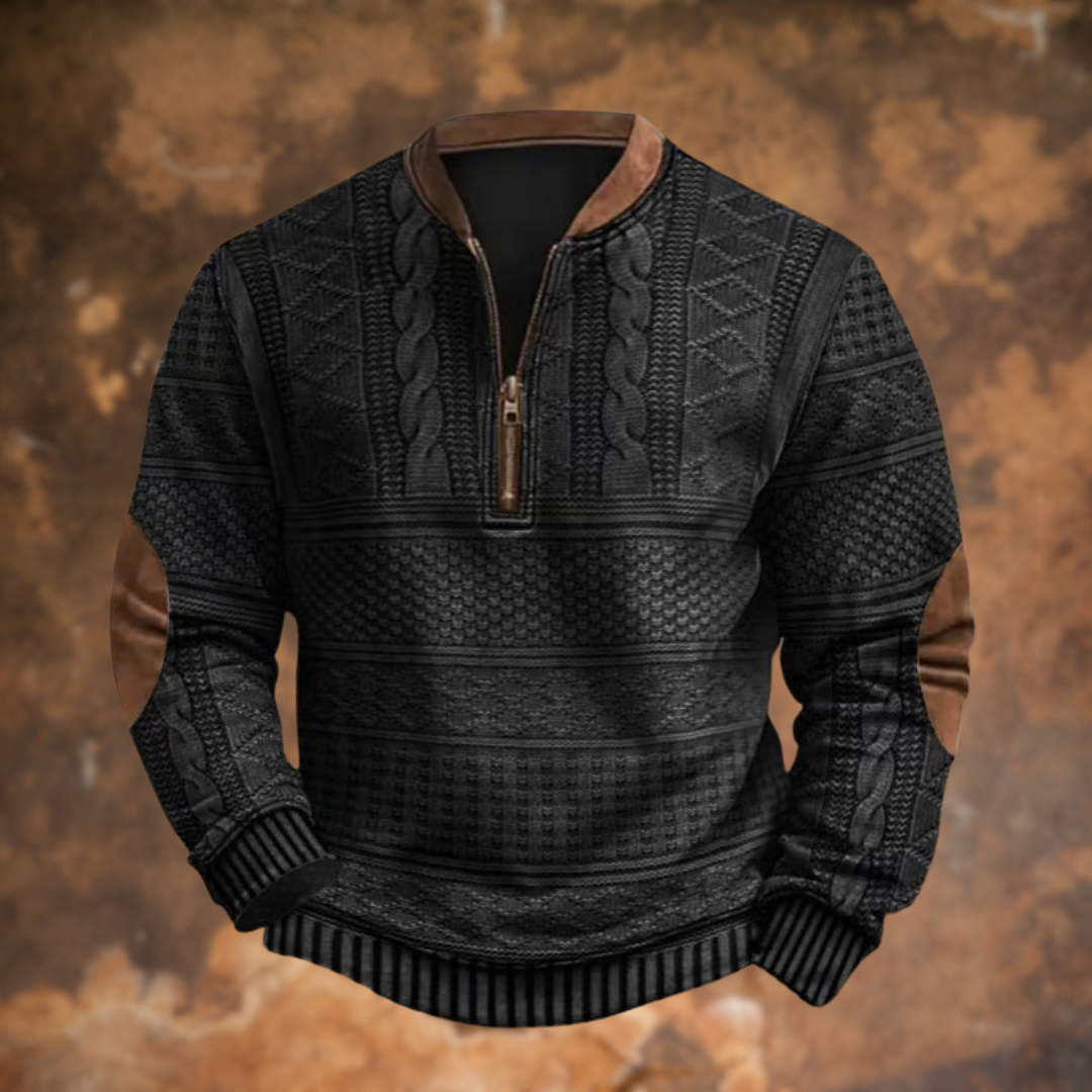 Black cable-knit quarter-zip jumper with tan suede elbow patches and collar trim