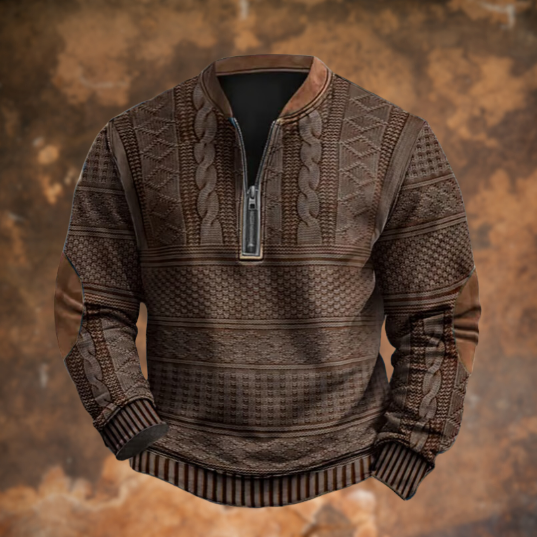 Brown cable-knit quarter-zip jumper with suede elbow patches and striped trim
