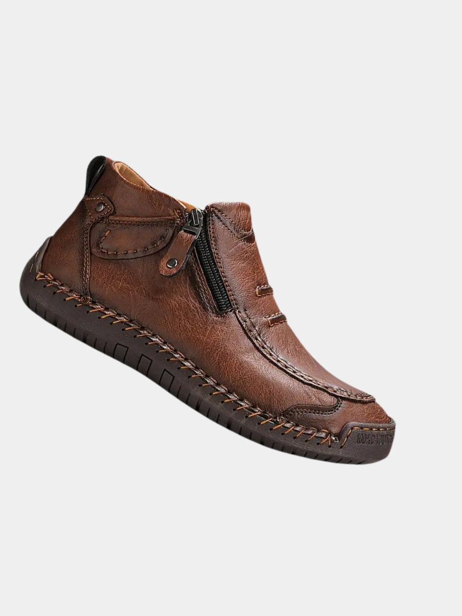 Brown leather ankle boot with side zip and hand-stitched detailing