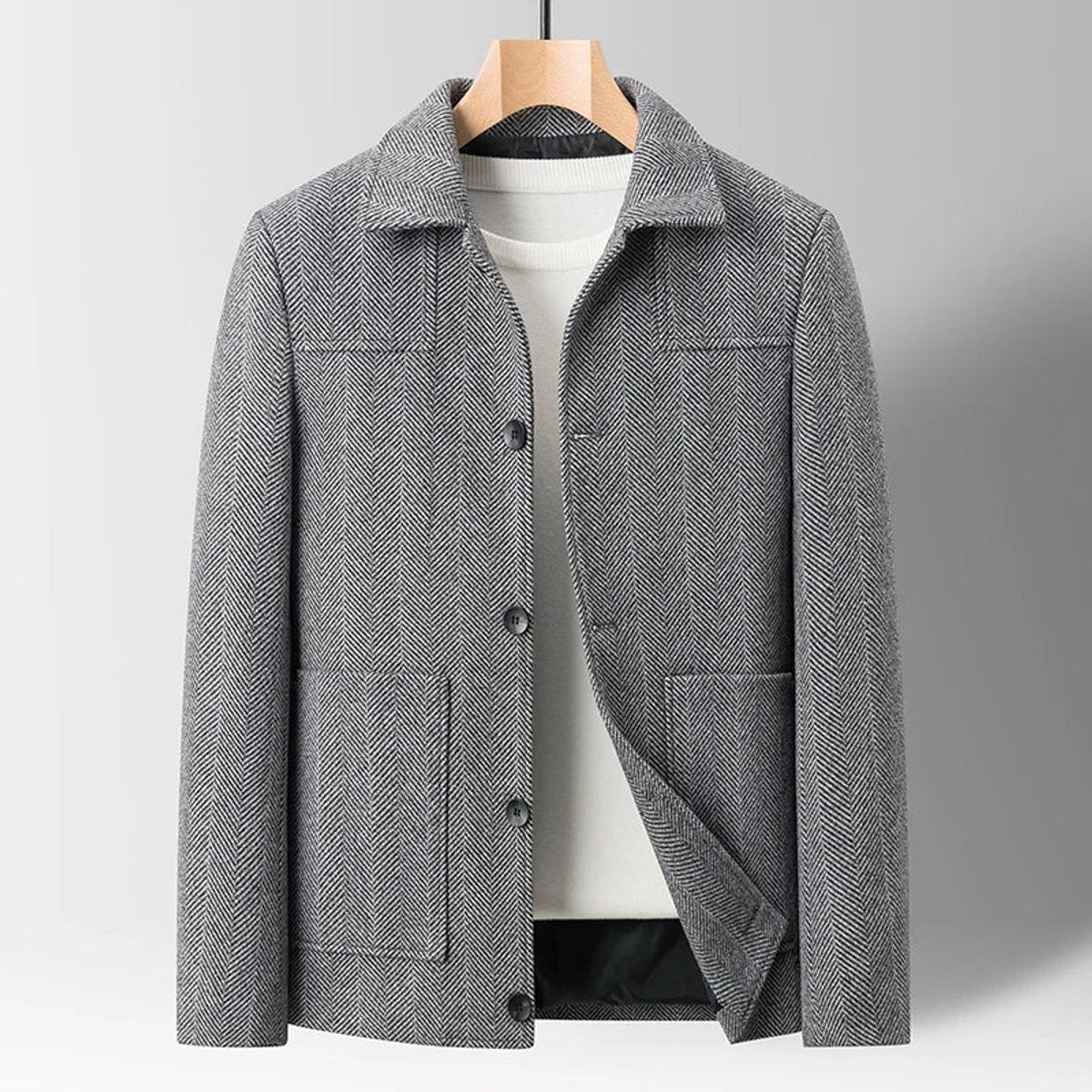 Grey herringbone wool-blend jacket with button fastening and patch pockets