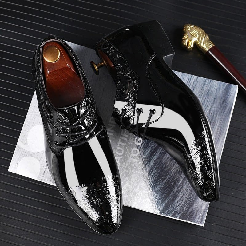 Black patent derby shoes with paisley embossing shown from above