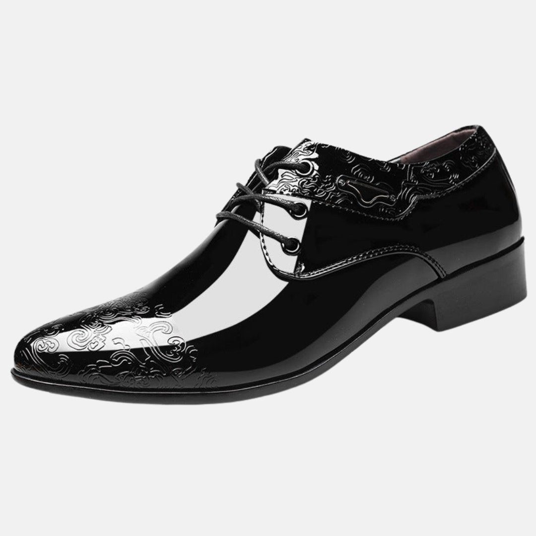 Glossy black patent leather formal shoe with lace-up front and low heel