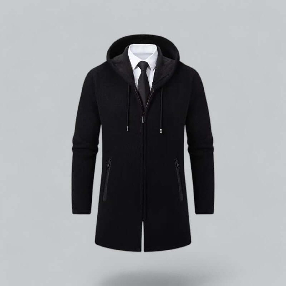 Black hooded longline coat styled over white shirt and tie