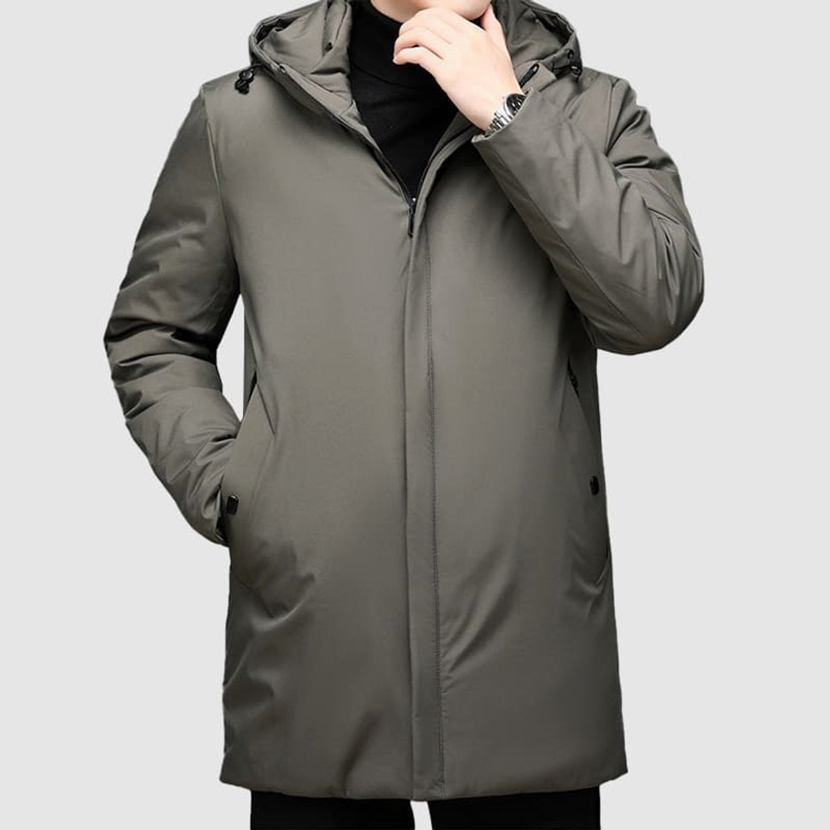 Khaki mid-length parka with drawstring hood and front zip