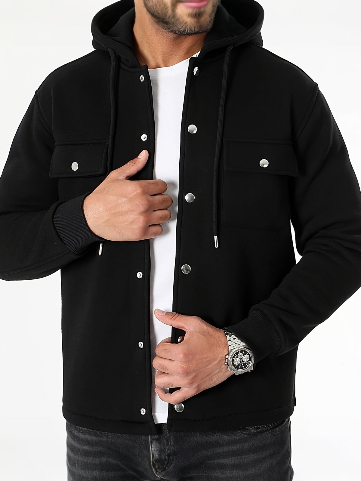 Black hooded shacket with popper buttons worn open over white tee