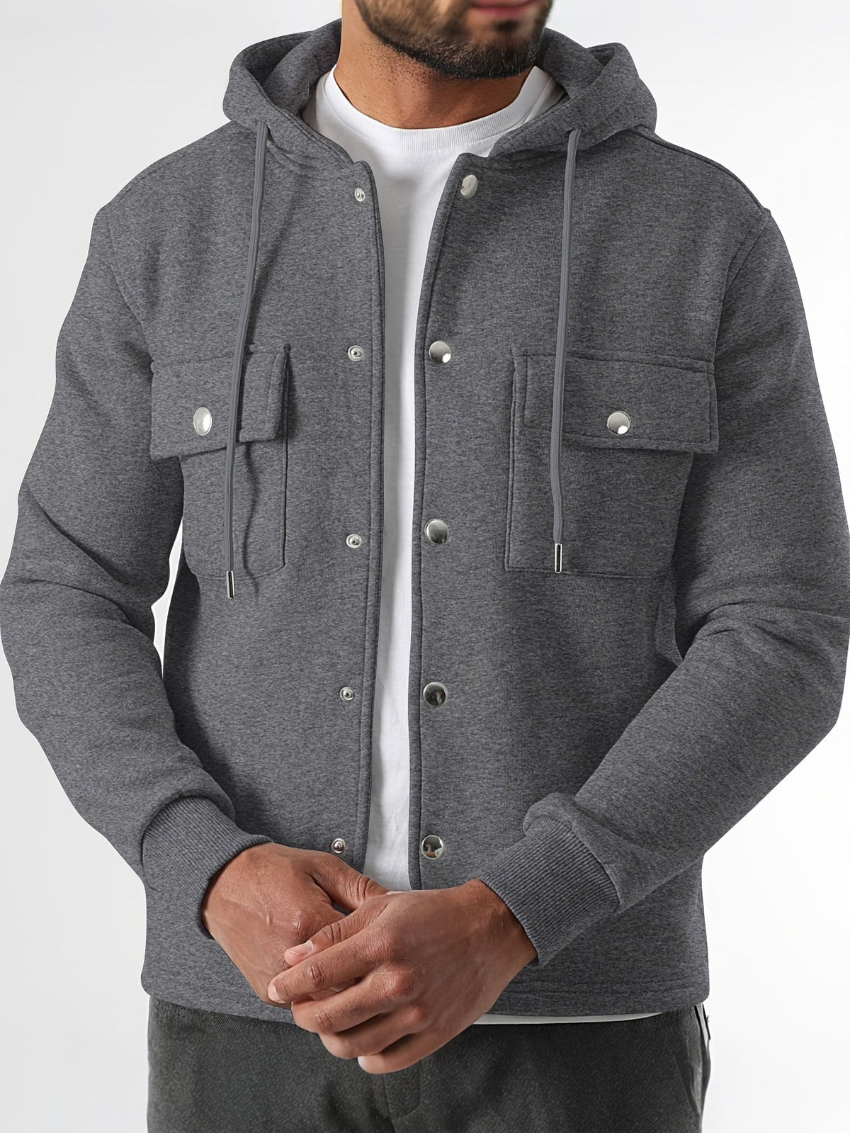 Charcoal grey hooded jacket with flap pockets and popper fastenings