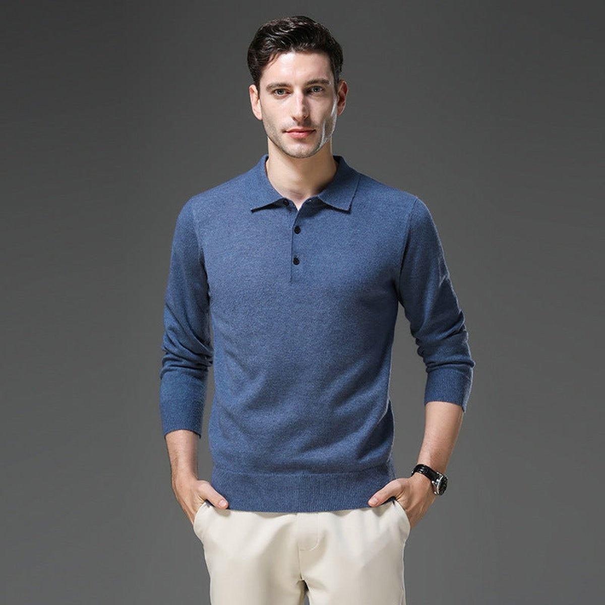 Man in blue cashmere knitted polo jumper with turn-down collar