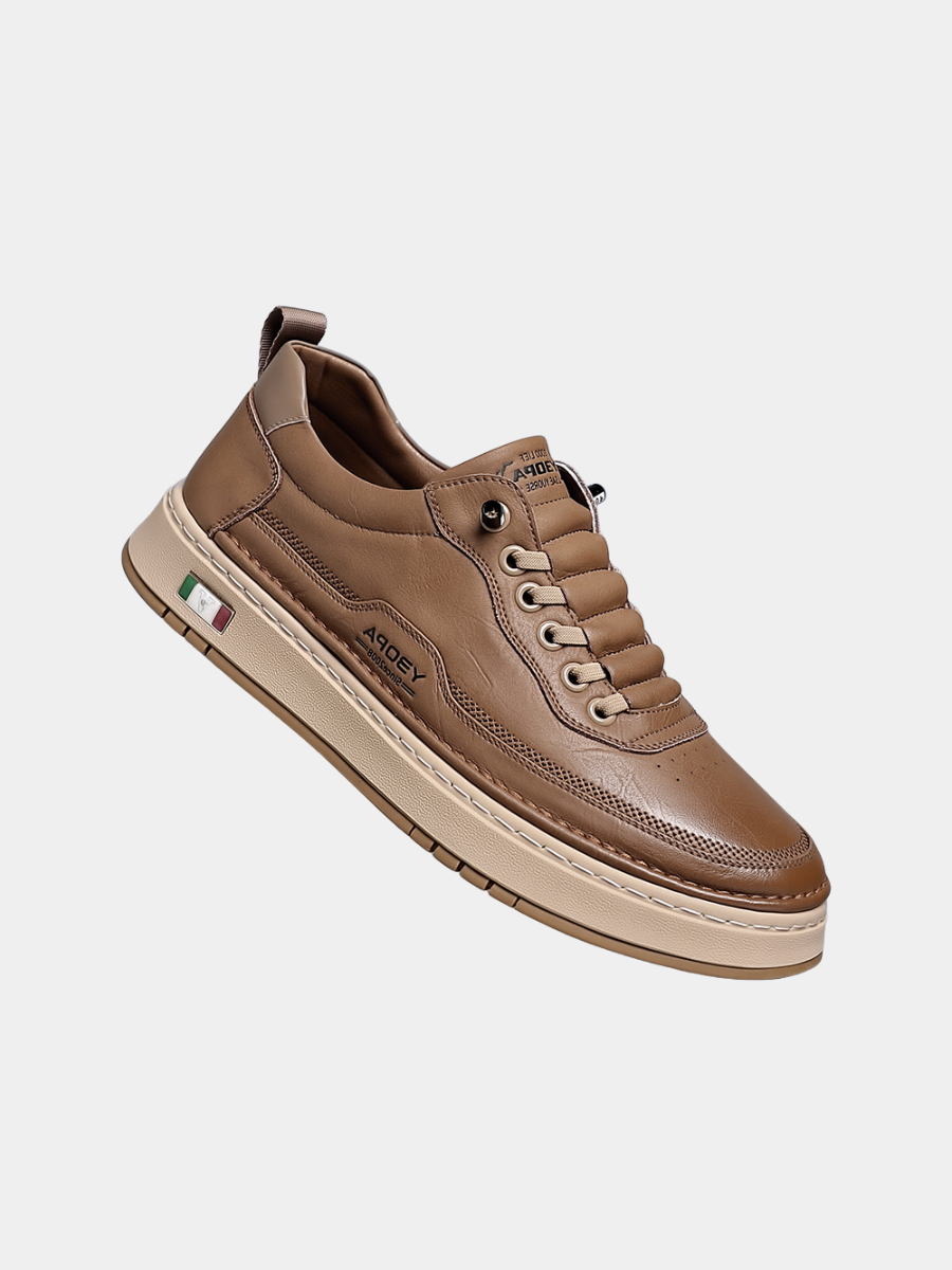 Brown leather men's trainer with elasticated laces and chunky sole
