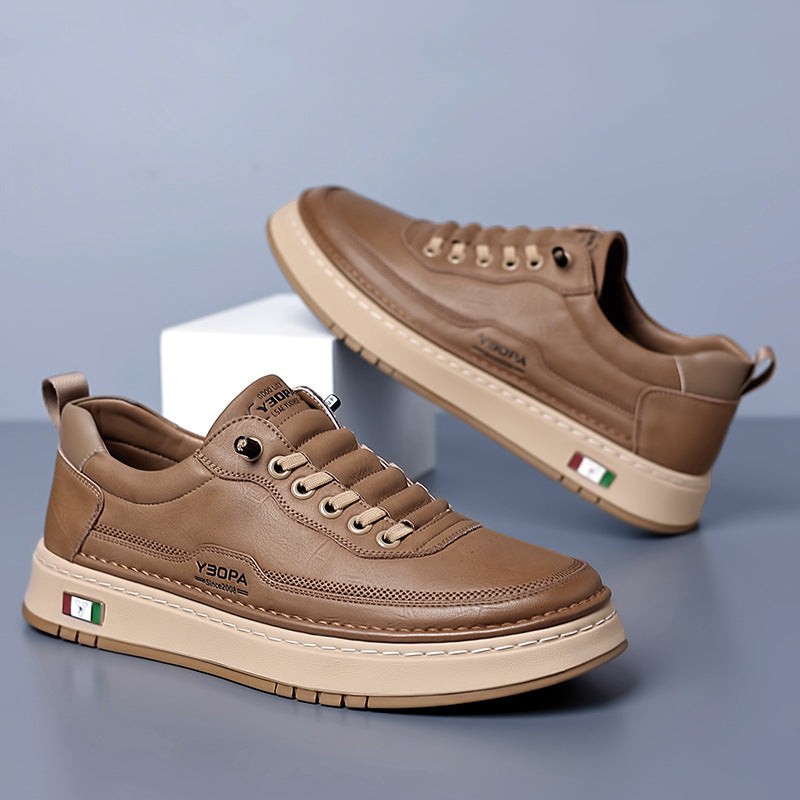 Camel leather trainers shown as a pair, side by side