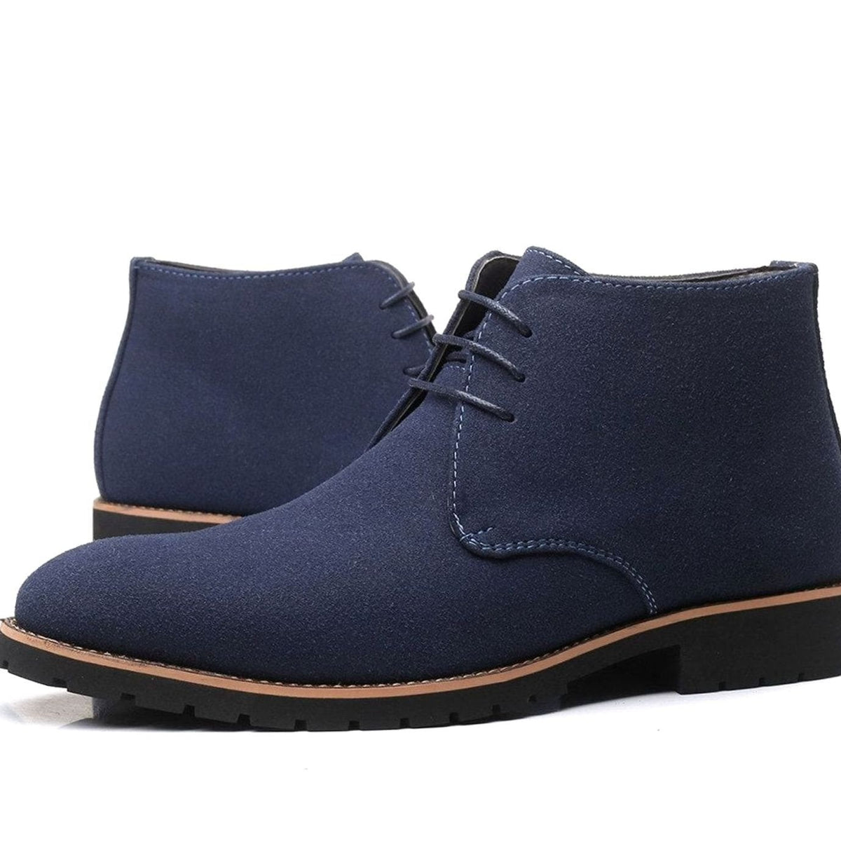 Navy suede lace-up ankle boots featuring tan trim and chunky rubber sole