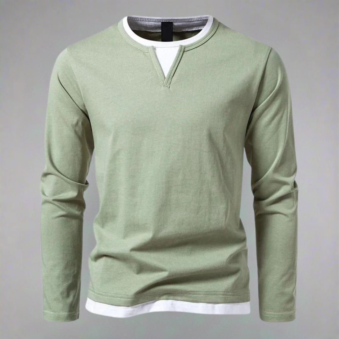 Sage green long-sleeve shirt with white layered V-neck detailing
