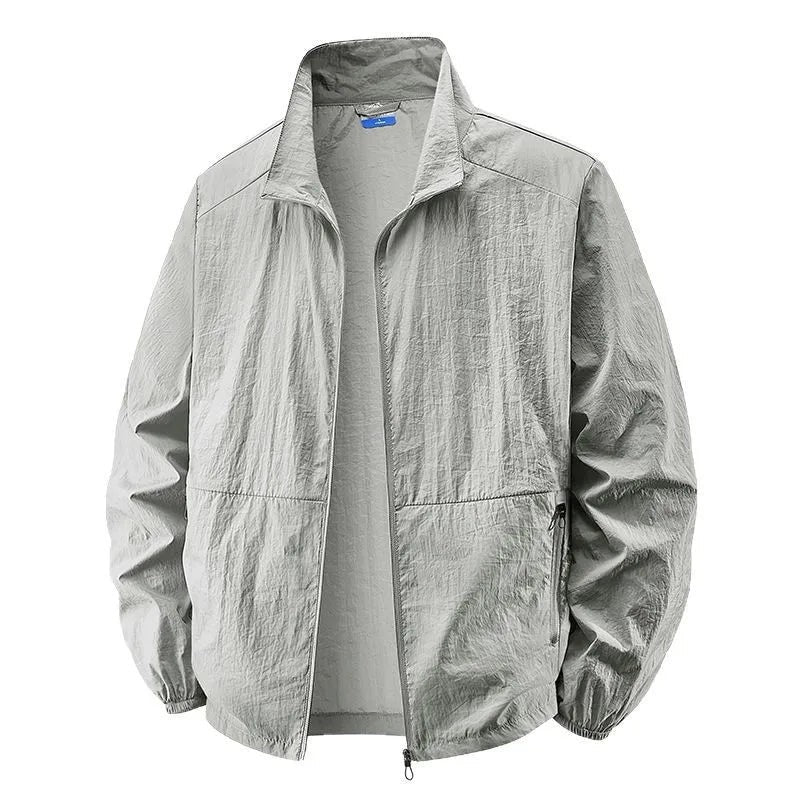 Light grey lightweight jacket featuring full zip and elasticated cuffs