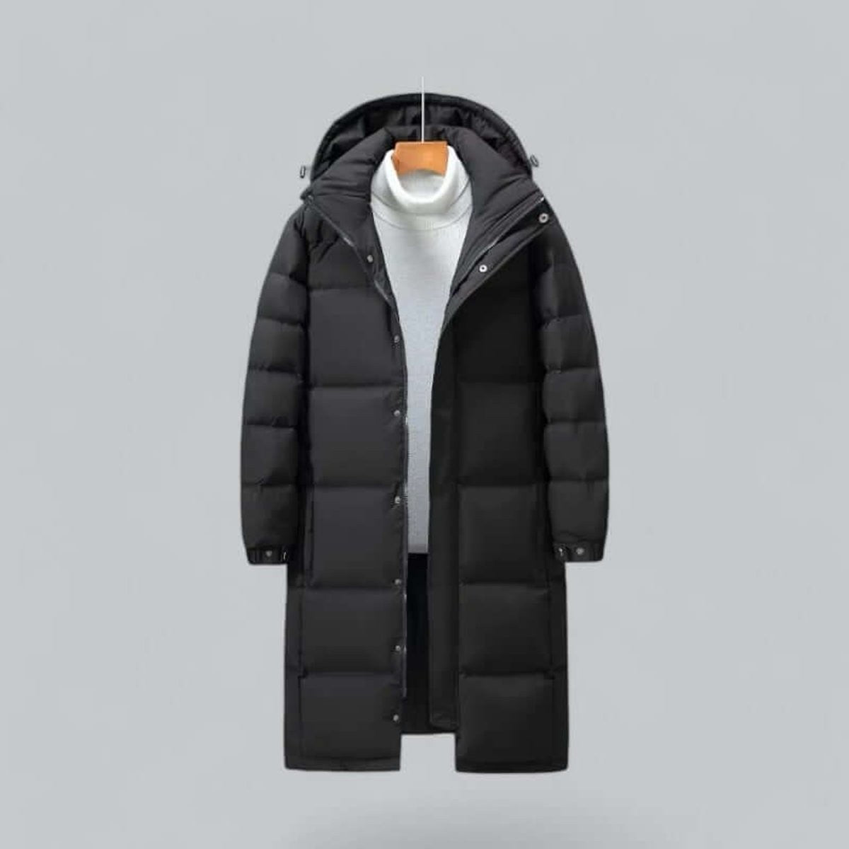 Black longline hooded parka on hanger, worn over grey jumper