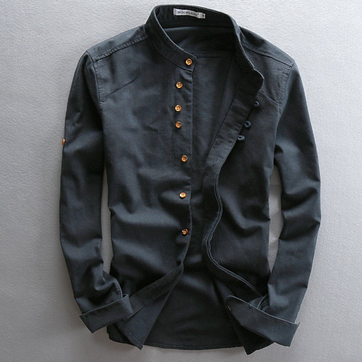 Charcoal black linen shirt showing mandarin collar and button-up front