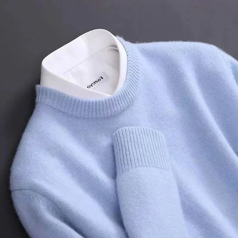 Close-up of pale blue jumper collar with ribbed knit trim