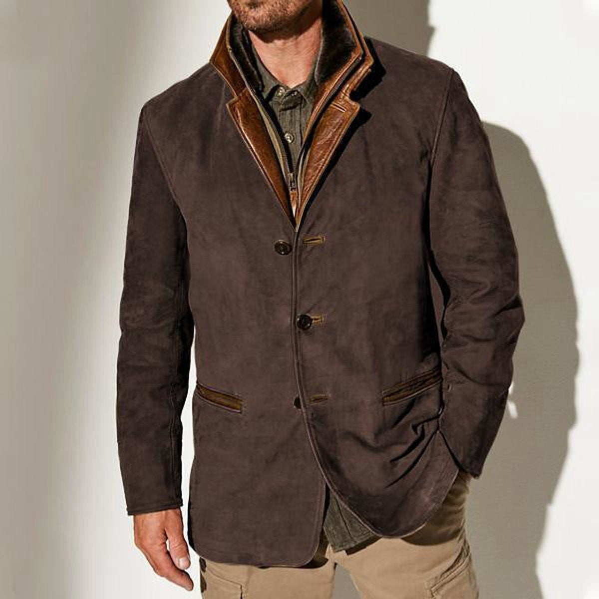 Brown suede jacket styled with tan leather collar detail, worn open