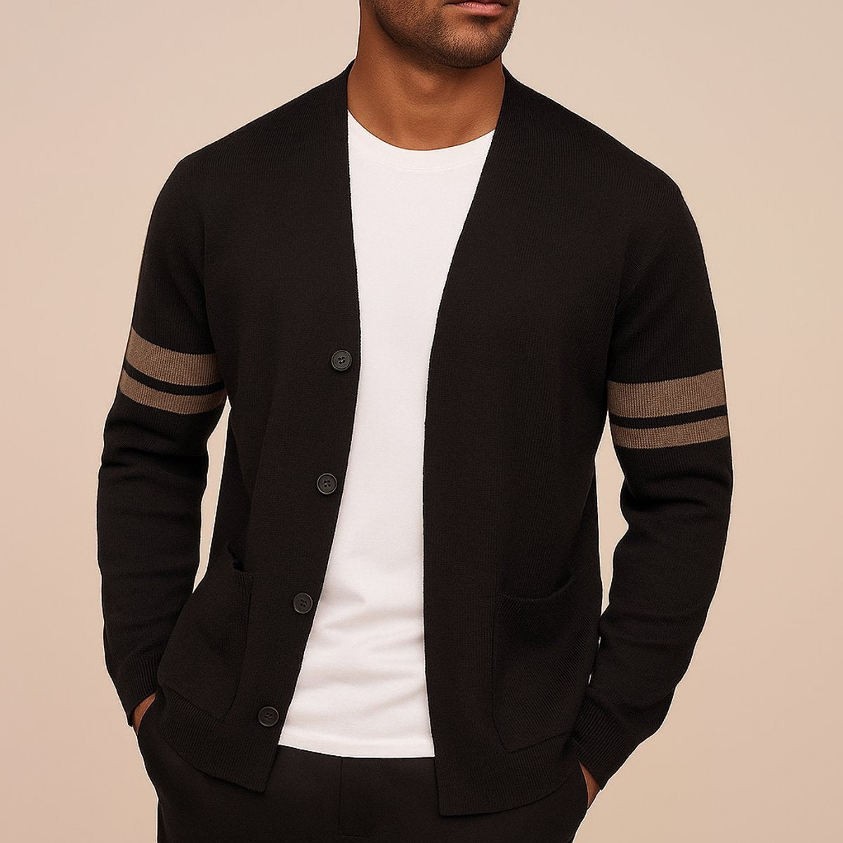 Man modelling black knitted cardigan featuring contrast striped sleeve detailing