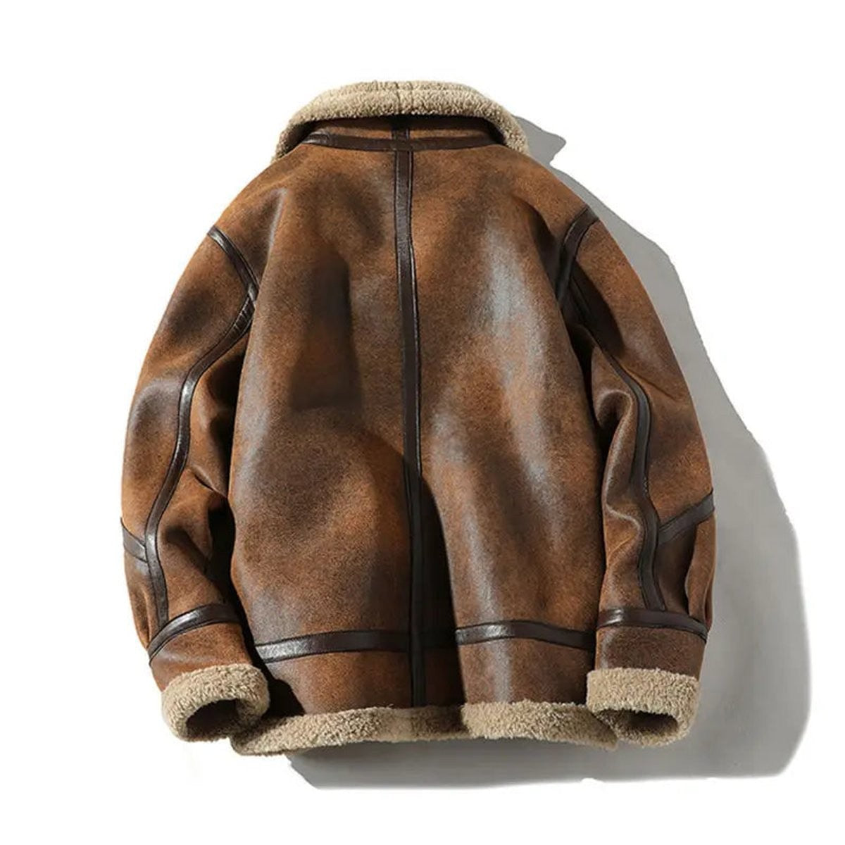 distressed brown shearling-lined bomber jacket shown from the back with seam detailing