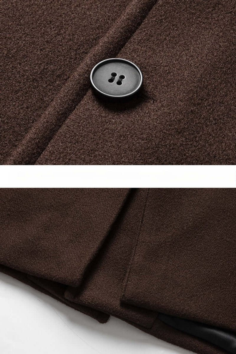 Close-up of brown coat's button, seam stitching and cuff detailing