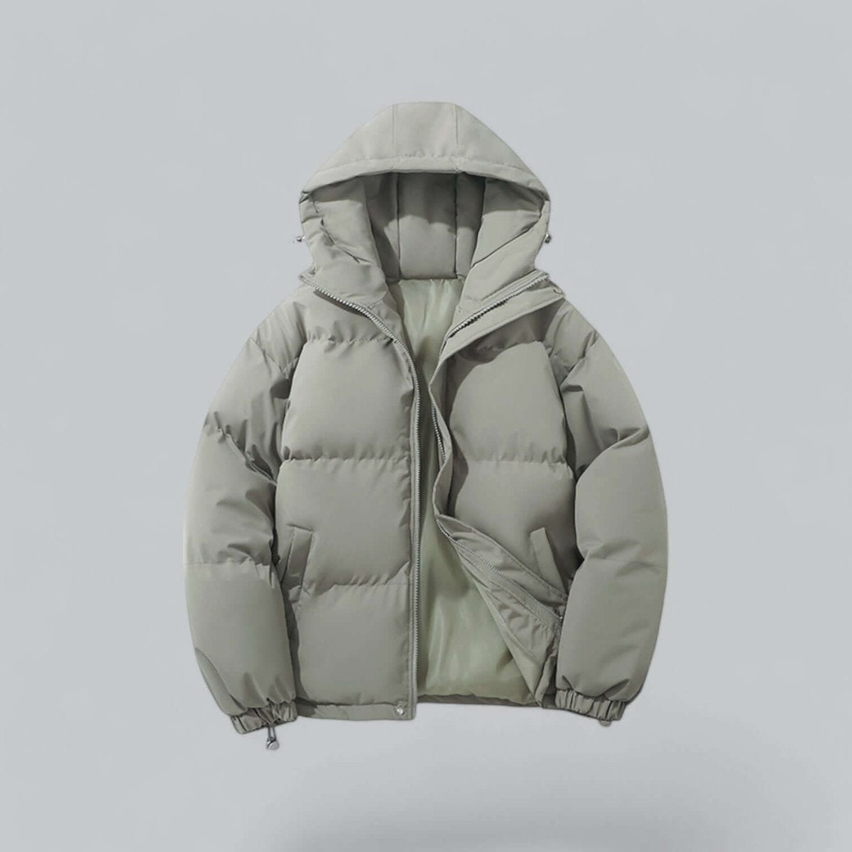 Sage green hooded puffer jacket with quilted panelling and zip