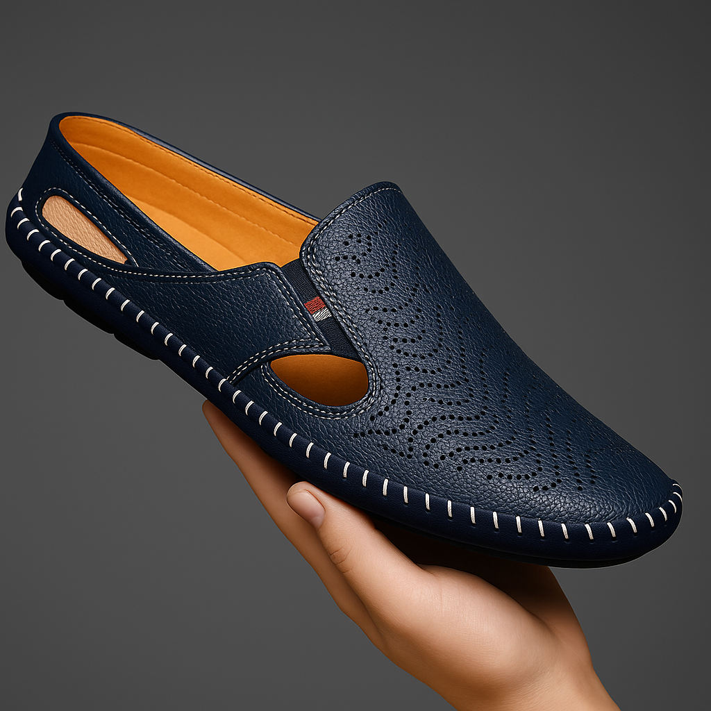 Navy leather loafer sandals showing tan lining and cut-out side vents