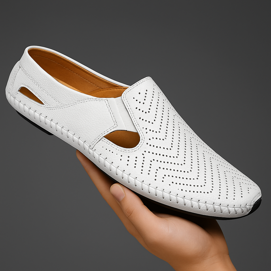 White leather perforated loafer sandals with tan insole and cut-out sides
