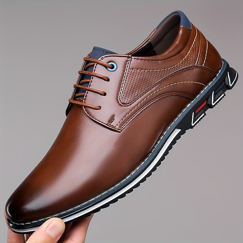 Brown leather lace-up shoe with perforated detailing and navy trim