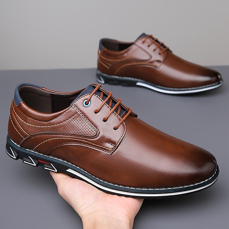 Brown leather derby shoes with tan laces shown as a pair