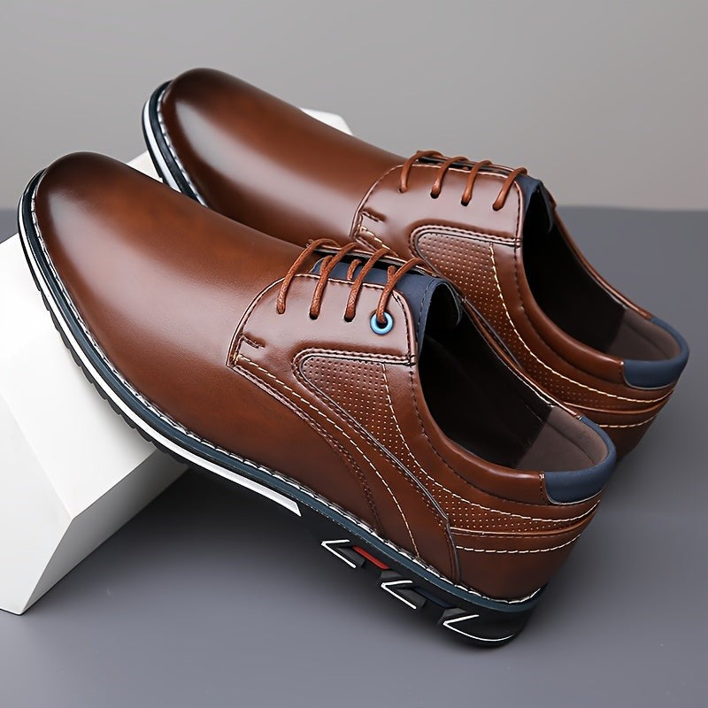 Brown leather lace-up shoes with contrast navy trim and stitched sole