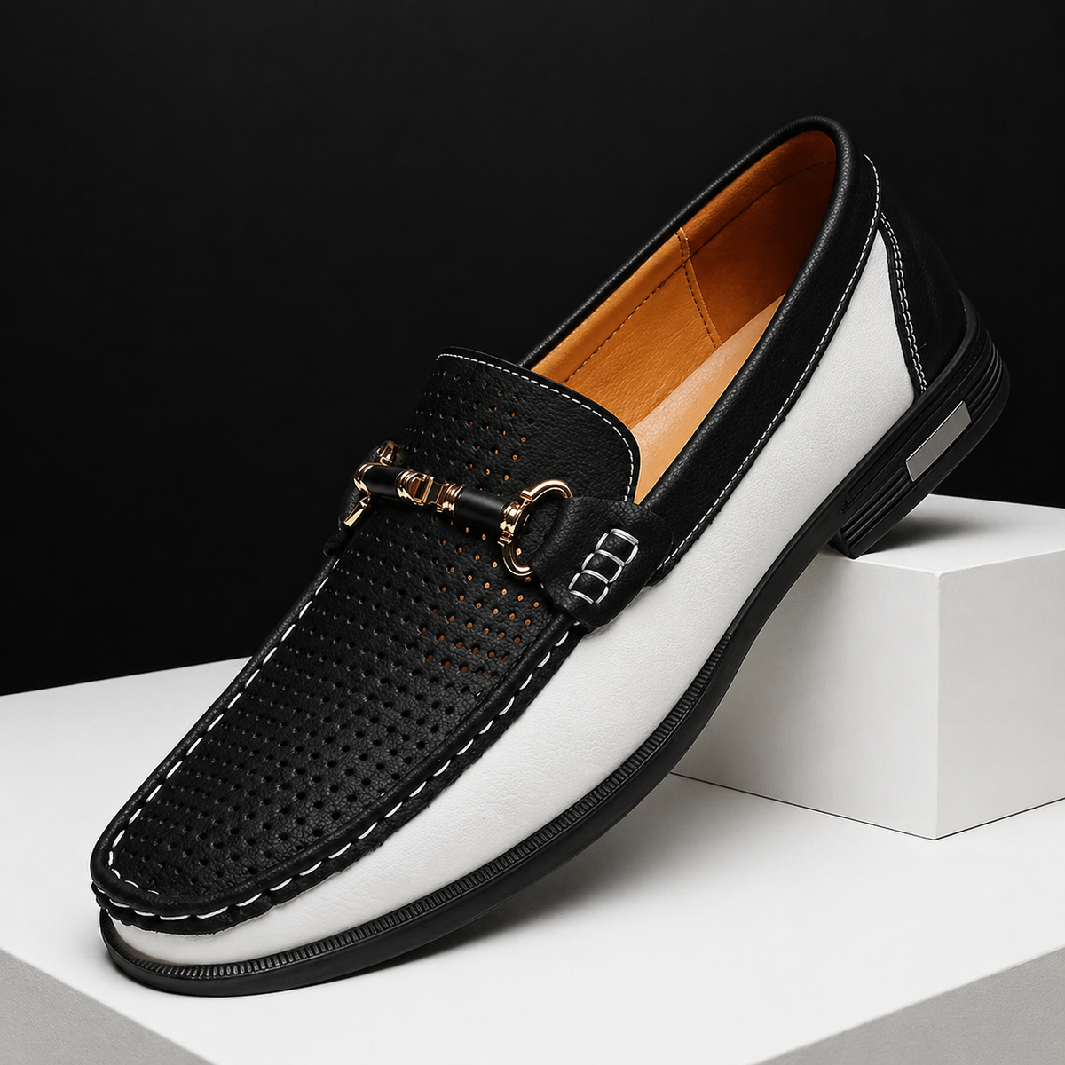Men's two-tone leather loafers with perforated toe and metal bit detail