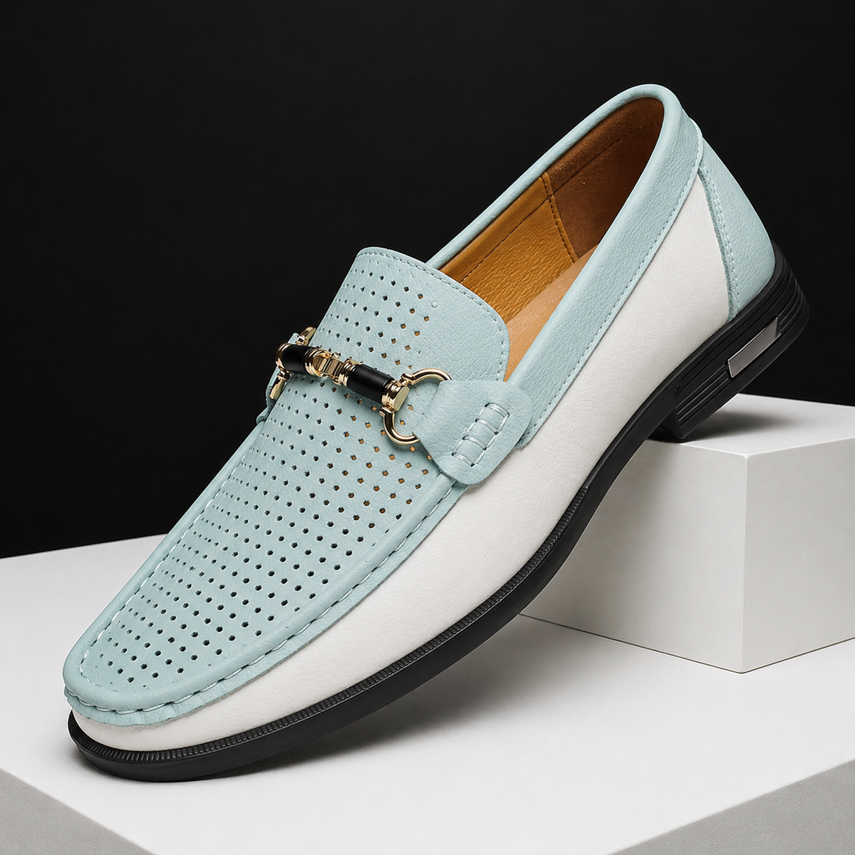 Mint blue and white leather loafers featuring perforated vamp and gold trim