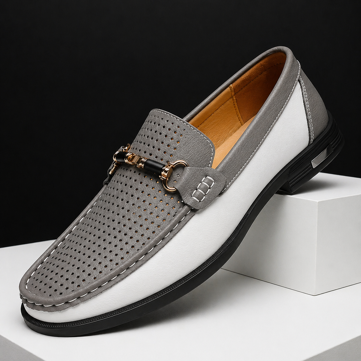 Grey and white perforated leather loafers with gold-tone snaffle bit
