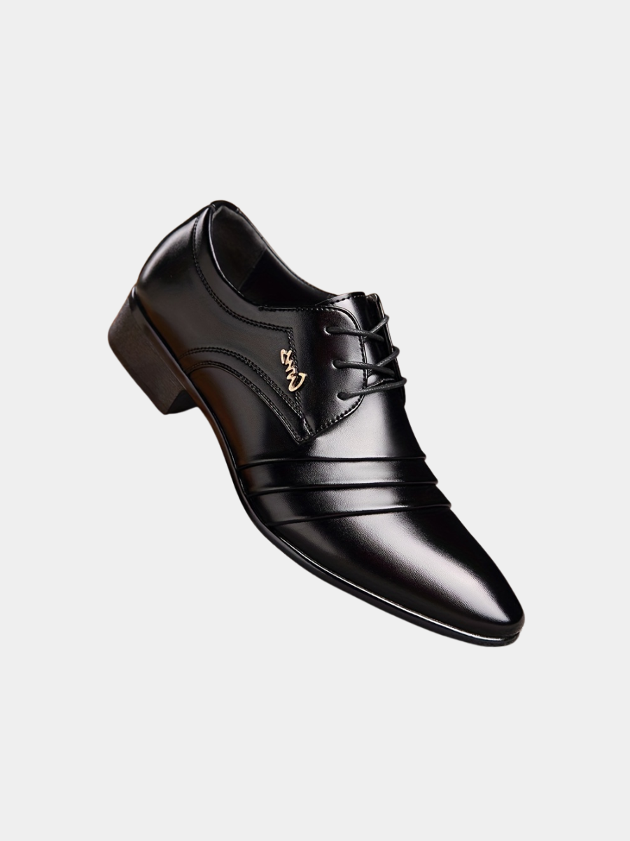 Black pointed-toe men's lace-up shoe with pleated leather detailing