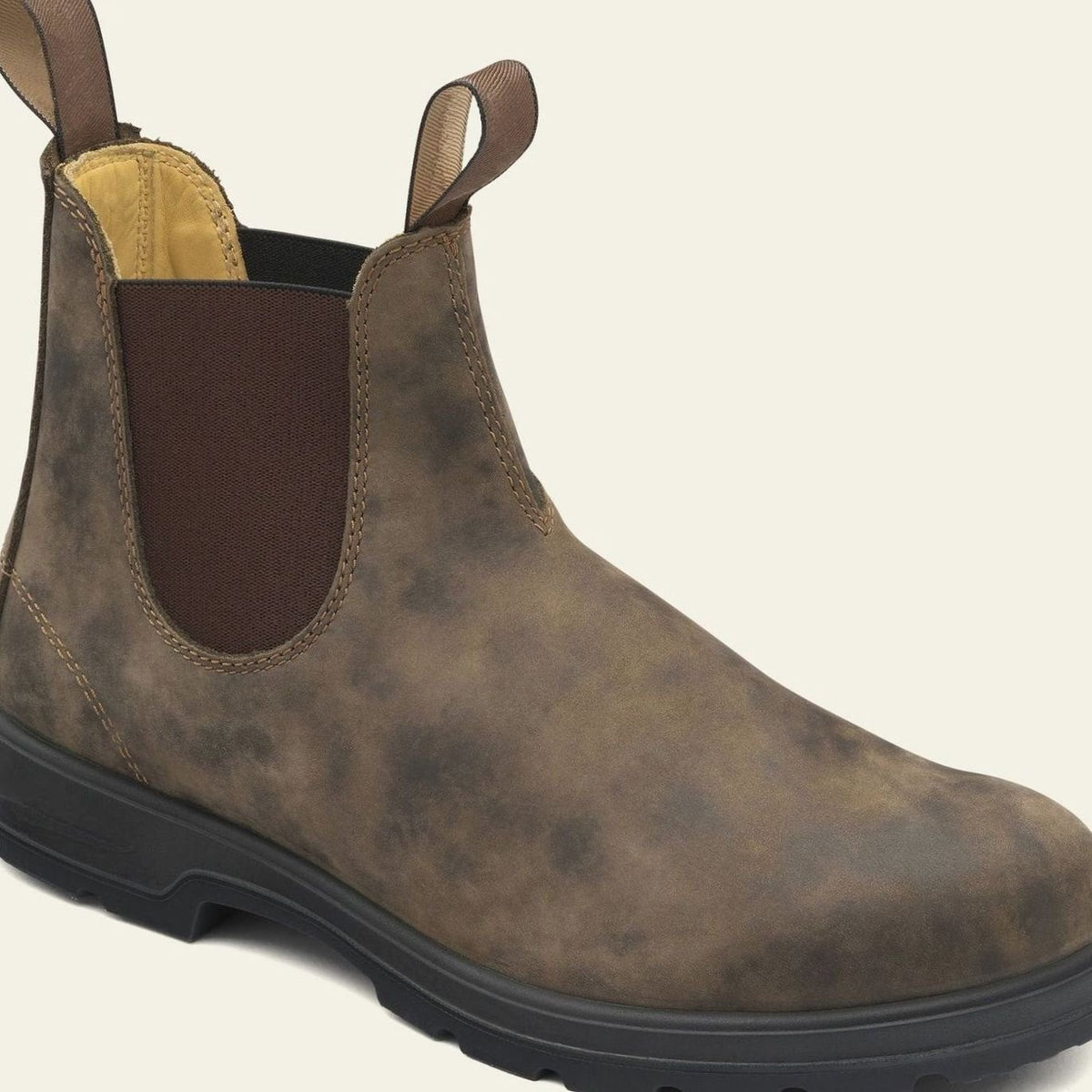 Rustic brown leather Chelsea boots featuring elastic gusset and rugged sole